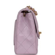 This Vintage Mini Square flap bag is of Light Purple Lambskin with matte gold hardware and has a front flap with signature CC turnlock closure, rear half moon pocket, and an interwoven purple leather and gold tone chain link shoulder/crossbody strap.The interior is lined in purple leather and features a zipper pocket with Chanel pull and an open pocket below.Collection: 6-Series (2000-2002)Origin: FranceCondition: Vintage; Excellent - This bag retains its shape with slight wrinkling, scratching Chanel Mini Square, Chanel Box, Chanel Mini, Bag Light, Purple Leather, Vuitton Bag, Vintage Chanel, Flap Bag, Matte Gold