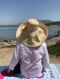 "Natural beige palm straw hat called the 'Poppadom!' A flexible wide brim hat you can switch into any shape - so it's lots of fun and can be styled for any occasion. Easy to wear, not hot and easy shape to your liking. Soft, natural material made from palm straw. Returns back to it's original shape. This hat is handmade, easy to wear, great for travel and a best seller! 🌀Flat top crown 🌀Flexible brim to adjust to your style 🌀Casual sun protection hat great for walking or gardening 🌀Lightweig Wide Brim Bucket Hat With Upf 50+ For Sunbathing, Upf 50+ Wide Brim Bucket Hat For Sunbathing, Beige Sun Hat For Sunbathing, Bucket Hat With Upf 50+ For Sunbathing, Wide Brim Hats For Sunbathing With Upf 50+, Brimmed Hat With Upf 50+ For Sunbathing, Beige Hats With Upf 50+ For Sunbathing, Upf 50+ Wide Brim Hat For Sunbathing, Beige Hat With Upf 50+ For Sunbathing