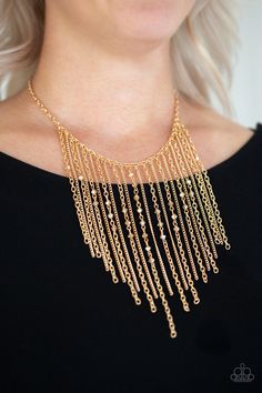 Varying in length, mismatched gold chains stream from the bottom of a classic gold chain. Faceted golden crystal-like beads sporadically dot the free-falling chains, creating a statement-making fringe below the collar. Features an adjustable clasp closure. Sold as one individual necklace. Includes one pair of matching earrings. Gold Fringe Necklace, Trendy Fringe, Golden Crystal, Hematite Crystal, Gold Fringe, Free Falling, 25 21, Silver Chains, Fringe Necklace