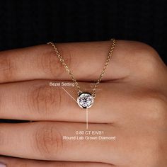 This stunning IGI-certified round lab grown solitaire diamond necklace will make a perfect gift for the special woman in your life. The bezel setting showcases the beautiful diamond, and the IGI certification guarantees that it is high quality and authentic. This diamond necklace will last a lifetime and make her feel special. "𝐓𝐨𝐠𝐞𝐭𝐡𝐞𝐫 𝐰𝐞 𝐜𝐚𝐧 𝐦𝐚𝐤𝐞 𝐭𝐡𝐞 𝐰𝐨𝐫𝐥𝐝 𝐚 𝐛𝐞𝐭𝐭𝐞𝐫 𝐩𝐥𝐚𝐜𝐞 𝐟𝐨𝐫 𝐥𝐢𝐯𝐢𝐧𝐠, 𝐥𝐞𝐭’𝐬 𝐠𝐨 𝐰𝐢𝐭𝐡 𝐦𝐢𝐧𝐢𝐧𝐠-𝐟𝐫𝐞𝐞 𝐝𝐢𝐚𝐦𝐨𝐧𝐝𝐬 𝐚? Diamond Wedding Necklace, Solitaire Diamond Necklace, Diamond Necklace Wedding, Make Her Feel Special, Diamond City, Diamond Solitaire Necklace, Best Gifts For Her, Man Made Diamonds, Bezel Set Diamond