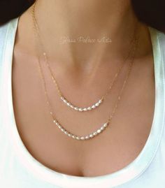 "* D E T A I L S * Freshwater Pearl Strand Necklace ~ Available in 100% Sterling Silver, 14k Gold Fill or Rose Gold Fill Capture the beauty of nature with strands of genuine freshwater rice pearls - Perfect for the bride or bridesmaids gifts! - Genuine freshwater rice pearls in a beautiful white / ivory - Lengths are show at 18\" & 20\"- Measure and choose your favorite length - Chain is a sparkly sterling silver or 14k gold fill, or rose gold fill chain - Necklace closes with a 14k gold fill, r Double Strand Pearl Necklace, قلادات متدلية, Multi Strand Pearl Necklace, Simple Pearl Necklace, Classic Pearl Necklace, Layered Pearl Necklace, Pearl Strands Necklace, Pearl Rings, Pearl Statement Necklace