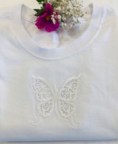 "Embroidered with a beautiful cutwork Butterfly with the cut-outs within the wings.  This is an intricate delicate design which has required great skill to create.   The cutwork design adds visual interest and uniqueness to the T shirt.  An exquisite elegant design looking stunning on white, grey, navy or black Unisex T shirts. This can be done on a Ladies \"V\" neck as well.  Just message me if you want this.   Perfect as a gift or to treat yourself for parties and everyday use, evenings out or Embroidered T Shirt, Embroidered Handkerchief, Present For Her, Gift For Sister, Presents For Her, Garden Parties, Delicate Design, Ladies T Shirt, Embroidered Tshirt