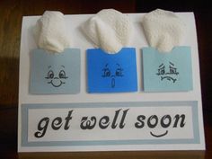 three marshmallows are on top of a paper with the words get well soon