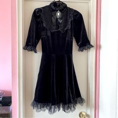 Nwt Dolls Kill Widow Ladyhawke Black Velvet Mini Dress With Lace Trim, Lace High Neck Collar And Cameo Brooch Pin. Size Medium. Never Worn. Goth, Grunge, Elegant, Sophisticated, Chic, Figure Flattering, Trendy. Gothic Black Vintage Dress For Costume, Black Gothic Vintage Dress For Costume Party, Black Gothic Dress For Costume Party, Vintage Black A-line Mini Dress, Vintage Black Dress For Costume Party, Black Long Sleeve Vintage Costume Dress, Black A-line Mini Dress For Costume Party, Black Long Sleeve Vintage Dress For Costume, Vintage Mini Dress For Costume Party