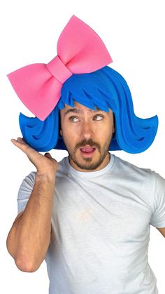 "Get this Awesome Wig with Large Bow Today! This Wig with Large Bow will definitely make you stand out at your next Party, Wedding, Corporate Event, Birthday, Quinceanera, or Halloween Party! Product Details: ✓Made in the USA ✓Handmade ✓High Quality Foam ✓One Size Fits Most ✓Customizable to your preferences \"This is where your party starts\". Give your next party a new life and rediscover your youth with Foam Party Hats. Foam Party Hats Guarantee At Foam Party Hats we believe our hats help brin Blue Costume Accessories For Themed Cosplay Events, Blue Costume Accessories For Cosplay Events, Blue Themed Costume Accessories For Cosplay, Fun Costume Hats For Carnival And Themed Events, Fun Halloween Cosplay Costume Accessories, Novelty Halloween Birthday Hat, Novelty Costume Hats And Headpieces For Birthday Halloween, Novelty Costume Hat For Birthday And Halloween, Novelty Birthday Halloween Costume Hat