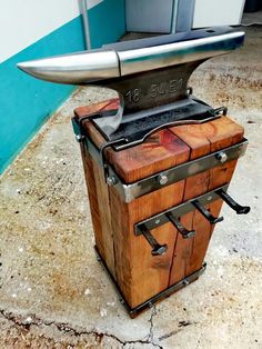 an old fashioned wooden box with a surfboard on top