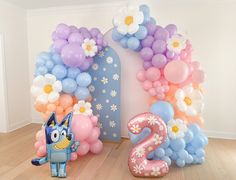 balloons are arranged in the shape of numbers and flowers