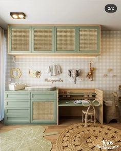 a baby's room with green cabinets and wicker furniture