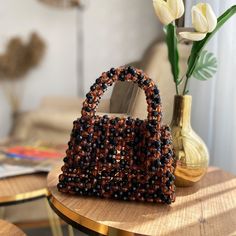 💎 FASHION DESIGN BEADS & CRYSTAL BAG - HANDMADE - HIGH QUALITY Beaded Bags are 100% handmade. This size making it perfect to hold your keys, cards, money and smartphones. 👜 ABOUT BEADED BAG Our Women's Beaded Bag is made of top quality pearl stones. We continue to use the best quality products.   -The dimensions of the model in the picture are as follows: Width 20 cm / 7.87 inches Height 30 cm / 11.81 inches Depth 10 cm / 3.93 inches 💃🏽 These new beaded bags will draw attention to you. It will shine in illuminated environments. It will be very suitable for your combinations. ❓BEAD HANDBAG SIZES NOT SUITABLE FOR YOU? Do not worry. Production is 100% ours. We can make it in any color, any model and size you want. Please contact us. Beaded Brown Tote Shoulder Bag, Brown Beaded Tote Shoulder Bag, Brown Beaded Handheld Bag, Beaded Brown Bags As Fashion Accessory, Handheld Brown Beaded Bag, Brown Beaded Bags For Daily Use, Daily Use Brown Beaded Bags, Beaded Brown Shoulder Bag Gift, Pearl Beaded Bag