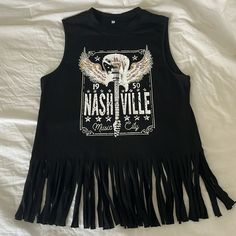 This Is A Brand New And Never Worn Sleeveless T Shirt. It Has A Nashville Graphic On It. No Tears Or Stains. Amazon Purchase, So No Brand On It. Size Small Nashville Graphic, Brandy Melville Graphic Tees, Amazon Tops, Maroon Top, White Ruffle Blouse, Silk T Shirt, Apple Bottoms, Muscle T Shirts, Sleeveless T Shirt