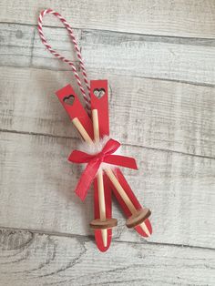 an ornament made out of popsicle sticks