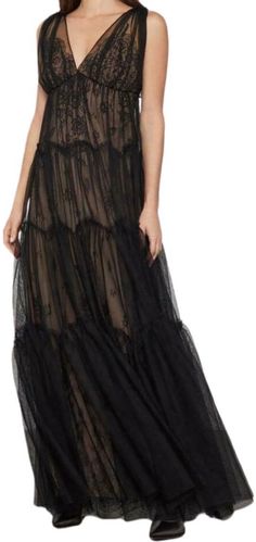 This tulle gown features tiers of pintucked fabric over delicate lace.100% polyester tulle;Contrast: 100% nylonLace knit 88% polyester, 12% spandex;Lining: 88% Polyester, 12% SpandexHand wash Lace Dresses With Ruffled Tiered Skirt, Lace Dress With Tulle Skirt For Gala, Sheer Tulle Tiered Skirt Dress, Sheer Tulle Dress With Tiered Skirt, Lace Dress With Lace Patchwork And Flowy Skirt, Lace Patchwork Flowy Dress, Sheer Tulle Tiered Dress, Lace Dress With Flowy Tulle Skirt, Flowy Lace Dress With Tulle Skirt