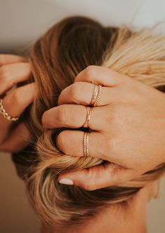 Wear this hammered ring individually for a simple adornment, or stack with other rings for a stronger statement. 2mm band width. Jess pairs it with our Cigar Band, Dani Chain Ring, and two Confetti Rings. Also shown with our Dylan Chain Ring and Swell Ring. Handmade in Eau Claire, WI. All of our jewelry is handmade to order just for you so each piece will be unique and may vary slightly from what is pictured. Dainty Gold Jewelry Aesthetic, Confetti Rings, Hello Adorn, Confetti Ring, Bolo Necklace, Horseshoe Earrings, Everyday Wear Jewelry, Sparkly Ring, Hammered Ring