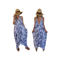 Our most versatile dress that will fit sizes small and up to 2X, it does not come in sizes. This stunning dress has a unique tropical Hawaiian design with  an asymmetrical high-low hem and pockets. Made from 100% super soft rayon fabric, this dress is great for any occasion. Measurements: 28 inches from armpit to armpit with garment lying flat (please double for circumference) 38 inches width at hip with garment lying flat (please double for circumference) 39 inches length frontside 44 inches length backside 29 inches V to middle frontside For reference, the model in the photo is 5 feet 2 inches. Feel free to contact us with any additional measurement questions you have or concerns. Summer Floral Print Maxi Dress With High-low Hem, Printed Asymmetrical Hem Vacation Dresses, Tropical Print Maxi Dress For Beach Day Out, Beach Season Tropical Print Maxi Dress For Day Out, Flowy V-neck Maxi Dress With Tropical Print, Printed Asymmetrical Hem Dress For Vacation, Printed Dresses With Asymmetrical Hem For Vacation, Casual Tropical Print Dresses For Beach Season, Sleeveless Leaf Print Summer Dress