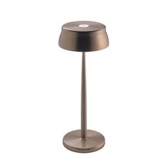 Turn the tune of your atmosphere in the direction you like. Add a bit of light and a lot of personality to rooms with the gorgeous and classic Sister Table Light by Zafferano. Its dimmable feature makes it convenient for you to enhance the room, according to the mood as it comes in 3 color temperatures: 2700K, 3350K, and 4000K. The LED is available in aluminum, blue, gold, copper, and green finishing options, which look elegant and attractive to go with any kind of decor. Its additional function Colorful Table Lamp, Battery Operated Table Lamps, Table Service, Rechargeable Lamp, Portable Table, Portable Lamps, Table Light, Gold Copper, Outdoor Areas