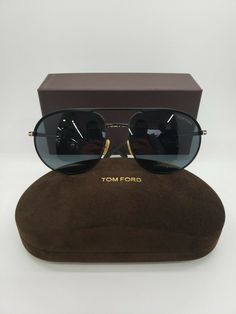 TOM FORD GIO TF772 02A UNISEX SUNGLASSES 59-17-140 NEW W. CASE & BOX!!!! SELLING BEAUTIFUL RARE TOM FORD SUNGLASSES FRAMES!!! FRAMES COME WITH ORIGINAL TOM FORD CASE AND BOX (as in 1st picture) LENS COLOR: TINTED BLACK WITH BACK ANTI-REFLECTIVE COATING Eye Size 59 Bridge Size 17 Temple length 140 BRAND NEW AND 100% AUTHENTIC GURANTEED!! MADE IN ITALY! I GUARANTEE THAT THESE EYEGLASSES ARE 100% AUTHENTIC, PLEASE CHECK MY FEEDBACK AND BID WITH CONFIDENCE!!! THANK YOU AND CHECK OUT MY OTHER GLASSES Tom Ford Men, Tom Ford Sunglasses, Unisex Sunglasses, Mens Glasses, Tom Ford, Sunglasses Case, Ford, Brand New, Sunglasses