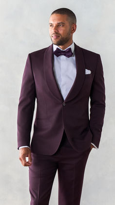 This is one plum that's always in season. The perfect shade of dusty purple is guaranteed to get compliments all day, all night, and all the way up until your Insta Stories expire. Includes a matching plum jacket and pants for a bold, party-ready look. 97% Merino Wool, 3% Elastane One-button closure Shawl Collar Side Vents Fully Canvassed Men Party Suit, Deep Purple Tuxedo Wedding, Plum Suits For Men Wedding, Plum Groom Suit, Purple Wedding Party Attire, Elegant Purple Suits For Fall, Elegant Purple Suit For Fall, Elegant Purple Fall Suits, Elegant Burgundy Outerwear For Party