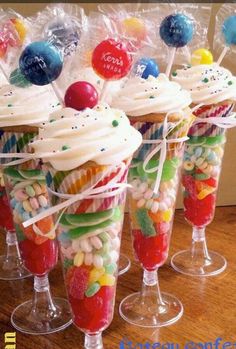 candy filled wine glasses with candies in them