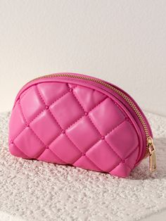 Say “Bonjour!” to your new favorite accessory, Shiraleah’s Mademoiselle Zip Pouch. Made from trendy quilted PU in a vibrant pink color, this compact, crescent-shaped cosmetic bag is ideal to carry all your odds and ends in style. The Mademoiselle Zip Pouch is made in the same style as the Mademoiselle Wristlet, Card Case, and Camera Bag which can be combined to form one magnifique collection. Pair with other items from Shiraleah to complete your look! Shiraleah is a trend-driven lifestyle brand Pink Portable Cosmetic Bag, Compact Pink Coin Purse With Removable Pouch, Pink Clutch Coin Purse With Removable Pouch, Chic Pink Cosmetic Bag With Removable Pouch, Trendy Pink Clutch Cosmetic Bag, Trendy Pink Clutch With Zipper Closure, Trendy Pink Clutch With Zipper, Pink Pouch Coin Purse With Zipper, Chic Pink Clutch Cosmetic Bag