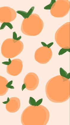 an orange pattern with green leaves on the top and bottom, against a light pink background