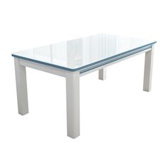 a white table with a glass top and silver legs