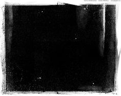 black and white photograph of an empty square with grungy paint on the edges