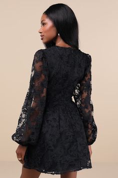 Endless compliments will always be the result of strutting out in the Lulus Gorgeous Outcome Black Mesh 3D Applique Long Sleeve Mini Dress! Three-dimensional floral-like appliques adorn a sheer mesh overlay (with dainty polka dot details throughout) as it shapes a lightly gathered bodice, a V-neckline, and sheer balloon sleeves with elastic at the cuffs. A banded, empire-style waist boasts two, tying velvet ribbon bows at the center, all atop a flirty skater skirt with a mini hem. Hidden back zipper/clasp. Fit: This garment fits true to size. Length: Mid-thigh. Size medium measures 33.25" from shoulder to hem. Bust: Great for any cup size. Waist: Fitted - very fitted at natural waist. Hip: Not Fitted - fuller skirt allows room for hips. Undergarments: May be worn with any standard bra. Fab 3d Applique, Vegas Dresses, Gathered Bodice, Rush Dresses, Latest Fashion Dresses, Feather Dress, Women Best, Empire Style, Mesh Overlay