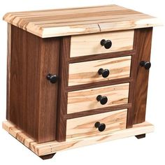 a wooden cabinet with drawers and knobs on the bottom drawer is made out of wood