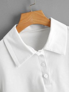 📦FREE Shipping on orders over $80 Style: Casual Color: White Pattern Type: Plain Neckline: Polo Length: Crop Details: Button Front Sleeve Length: Short Sleeve Sleeve Type: Regular Sleeve Season: Summer Fit Type: Regular Fit Sheer: No Material: Polyester Composition: 65% Polyester, 35% Cotton Fabric: Slight Stretch Solid Color Polo Collar Top With Buttons, White Polo Collar Top With Buttons, White Collared T-shirt With Buttons, White Button-up Plain Top, White Plain Button-up Top, White Tops With Button Closure And Collar, White Top With Button Closure And Collar, White Collared Top With Button Closure, Polo Neck