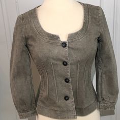 Ultra Feminine Denim Jacket. Nipped In Waist With Collarless Scoop Neck. 4 Buttons Down The Front; Seaming Detail All Around The Waistline. Picked Up At A Theory Sale, This Is Labeled As 1 Size. I Would Estimate At 2 Or 4. Measures Flat Across Front Armpit To Armpit 16”. Flat Across Waist About 15” Shoulder To Hem Is About 20”. Shoulder To Wrist Is 20”. Color Is A Greenish Gray And The Color Is Intentionally Uneven With Lighter And Dark Spots. Originally $390 Chic Fitted Denim Jacket With Long Sleeves, Fitted Washed Outerwear With Long Sleeves, Fitted Washed Denim Jacket For Work, Chic Fitted Denim Jacket With Snap Buttons, Fitted Chic Denim Jacket For Fall, Chic Fitted Denim Jacket For Fall, Fitted Washed Outerwear For Work, Chic Fitted Denim Jacket, Fitted Button-up Washed Outerwear