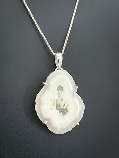 "GENUINE SOLAR QUARTZ PENDANT, WHITE AGATE CRYSTAL GEMSTONE NECKLACE FEATURES: Metal: All components are made from solid .925 Sterling Silver Model is wearing 16\" in length solid .925 Sterling Silver Chain Length available: 16\", 18\" or 20\" Charm Measurements: Natural Solar Quartz Pendant Height: 2 Inches Width: 2 Inches Please send me a message if you have any questions before or after placing your order. Please visit my storefront to view more of my creations: vonzjewel.etsy.com Thanks a lo Crescent Jewelry, Texas Jewelry, Silver Model, Celtic Necklace, Moon Bracelet, Sterling Silver Bead Bracelet, Druzy Jewelry, June Birthstone Jewelry, August Birthstone Jewelry