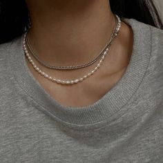 This is a layered necklace made with freshwater pearls, designed to be worn as a clavicle chain necklace. It is a perfect accessory for the summer season and can be paired with various outfits. The freshwater pearls add a touch of elegance and sophistication to the necklace. 👌 M A T E R I A L • Sterling Silver Chain• Freshwater Pearls• This product is hypoallergenic (nickel free) and tarnish resistant 📏 S I Z E • Necklace Length : 29.7 inch (75.5 cm) + Extender 2.76 inch (7 cm) • Weight: 0.95 Trendy Pearl Chain Necklace, Trendy Pearl Layered Necklace, Trendy Pearl Drop Necklace, Trendy Pearl Necklace With Beaded Chain, Pearl White Pearl Clavicle Chain Necklace, Trendy Pearl Drop Necklaces, Trendy Pearl Charm Necklace, Trendy Everyday Pearl Chain Necklace, Trendy Pearl Chain Layered Necklace