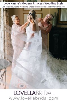 the bride is getting ready to walk down the aisle in her wedding dress and veil