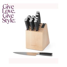 a knife holder with knives in it and the words give love, give style written below