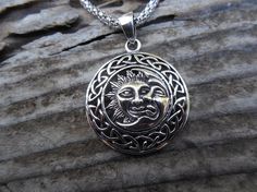 ON SALE Sun and moon necklace handmade in sterling silver Sterling Silver Sun And Moon Medallion Necklaces, Silver Sun And Moon Medallion Jewelry, Silver Medallion Jewelry With Sun And Moon Design, Silver Medallion Necklace With Sun And Moon Design, Vintage Silver Necklace With Sun And Moon Design, Sun Necklaces, Celtic Border, Sky Blue Topaz Ring, Sun And Moon Necklace