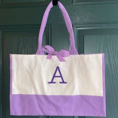 Nice, Wide Tote Bag With Letter A Embroidered! Dimensions 12”X17”X8”. Ribbon Closure. Brand New. Letter A, Canvas Tote Bag, Womens Tote Bags, Canvas Tote, New Color, Size 12, Ribbon, Tote Bag, Brand New