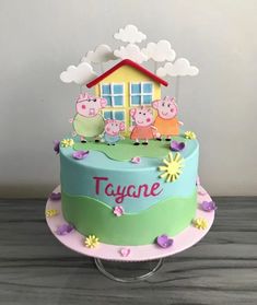 a peppo pig themed birthday cake with peppa and friends on the top tier