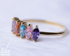 Birthstone mothers ring with your desired birthstones. A unique personalized gift for mom, for grandma ♡ It is also available with 1-2-3-4-5-6-7 or 8 stones. Please let me know if you are interested. ★ PRODUCT DETAILS; *Band Width: 1.3mm *Gemstone Size: 3mm*5mm for each stone. *Material Options: 925k Sterling Silver & Rose Gold Filled Over Silver & Yellow Gold Filled Over Silver *Birthstone Options: You can see the birthstone chart in the last photo of the listing. ★ HOW TO PLACE YOUR OR Multicolor 14k Gold Birthstone Ring As Gift, Heirloom Multicolor Jewelry For Gifts, Multicolor Multi-stone Birthstone Ring For Gift, Multicolor Multi-stone Birthstone Ring As Gift, Oval Stackable Birthstone Ring For Gifts, Multicolor Stackable Birthstone Ring For Gift, Multicolor Sterling Silver Birthstone Ring As Gift, Multicolor Gemstone Birthstone Ring For Gift, Multicolor Gemstone Birthstone Ring As Gift