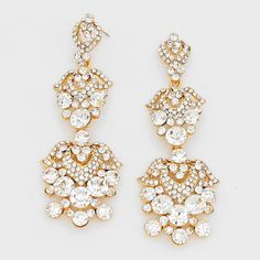 • Color : Gold, Clear• Size : 1 1/4' W, 3 1/2' L • Post Back• Crystal Rhinestone Chandelier Pageant Prom Earrings Gold Prom Earrings, Long Crystal Earrings, Pageant Earrings, Gold Prom, Premium Jewelry, Earrings Chandelier, Prom Earrings, Chunky Earrings, Bling Wedding