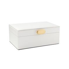 a white box with a gold handle on the top and bottom, sitting on a white surface