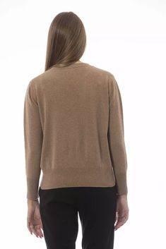 Elevate your knitwear collection with the Baldinini Trend’s exquisite crew neck sweater, a perfect blend of luxury and comfort. Crafted in MD, this piece boasts a harmonious mix of 50% wool and 50% cashmere, ensuring warmth and a soft touch against the skin. Its sophisticated beige hue complements a variety of ensembles, while the ribbed neck, wrists, and hem add a touch of classic elegance. The focal point is the chic monogram Baldinini Trend in metal that subtly sits on the garment, showcasing Haute Couture Brands, Knitwear Collection, Beige Pullover, Cashmere Color, Sweater Trends, Denim Jacket Men, Women Sweater, Beige Sweater, Sweater Sleeves