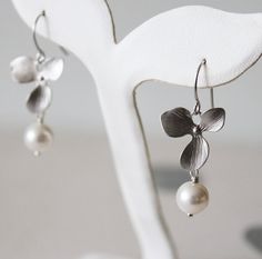 Glam Orchid Earrings. Silver. Swarovski Pearl. Bridal Attire Silver Pearl Drop Flower-shaped Earrings, Delicate Silver Petal Earrings, Hypoallergenic Sterling Silver Flower Earrings For Wedding, Silver Flower Shape Pearl Drop Earrings, Silver Flower Earrings With Pearl Drop, Silver Sterling Pearl Drop Flower Earrings, Elegant Hypoallergenic Silver Flower Earrings, Silver Sterling Flower Earrings With Pearl Drop, Silver Petal-shaped Earrings For Gift