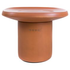 a brown stool with the word moooi on it's top and bottom