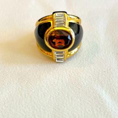 This Christian Dior Gold Plated Cocktail Ring Combines Fashion Stones To Simulate Topaz, Onyx, And Diamond Baguettes, In This Powerful Statement Ring. While Ring Is Currently Set At Size 6.5, Adjustable Band Will Flex To Fit Multiple Sizes (Visible In Photos 6-7). Designer Logo Stamp Visible In Photos 8-9. Ring Is In Pristine Condition, Like Brand New And Never Been Worn. *Remember To Bundle And Save On Shipping! Dior Gold, Vintage Cocktail Ring, Dior Vintage, Designer Logo, Vintage Cocktail, Christian Jewelry, Logo Stamp, Baguette Diamond, Cocktail Ring