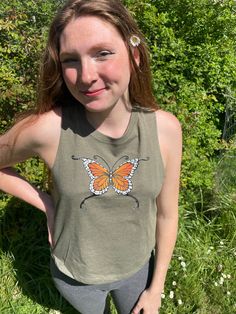 Hello all! This is a flowy crop tank by Bella, very cute & flattering, and they fit great. I have printed my Monarch Butterfly design on these, and the tank color is Heathered Olive. The white layer on this design glows in the dark!  Size chart as last picture, and of course free shipping! Thank for looking Monarch Butterfly, Butterfly Design, Crop Tank, In The Dark, Womens Clothing Tops, Glow In The Dark, The White, Mother’s Day, Tank Tops Women