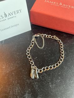 James Avery Retired Ballerina Ballet Point Dance Shoes Charm Bracelet Sterling Silver 6.5" JA bracelet  Comes with Avery Box.  Before purchasing, please make sure your shipping address is correct in your Etsy account. I will not change the shipping address after purchase due to so much buyer fraud going around. If you purchase and need an address change, we will have to cancel the transaction and start over.  Return Policy- Buyer must contact me within 5 days of delivery to notify me of return a Shoes Charm, James Avery Charm Bracelet, Address Change, James Avery Charms, James Avery, Shoe Charms, Etsy Account, Artisan Jewelry, Sterling Silver Bracelets