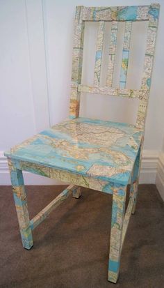 a chair made out of maps is shown on the webpage, and it appears to be for sale