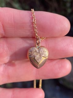 ~ Here we have a beautiful antique ornate gold heart pendant  ~ Measures 20.75mm north to south approximately including bail. Heart itself 14.2mm north to south approximately.  ~ In excellent condition, light wear in keeping with age and use, no damage to report, a little solder work can be seen where bale attaches .   ~ Stamped to reverse for 9ct gold ~ Chain shown for scale and styling purposes only, not included in sale, price is pendant only, chain available separately  ~ Any questions or fo Heart-shaped Gold Jewelry With Vintage Charm, Valentine's Day Medallion Necklace With Vintage Charm, Valentine's Day Vintage Charm Medallion Necklace, Vintage Charm Heart-shaped Yellow Gold Jewelry, Victorian Brass Necklace With Heart Charm, Vintage Jewelry With Heart Charm And Round Pendant, Vintage Charm Yellow Gold Heart Pendant Jewelry, Vintage Round Pendant Jewelry With Heart Charm, Vintage Heart Charm Round Pendant Jewelry