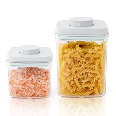 two plastic containers filled with different types of pasta and seasoning next to each other