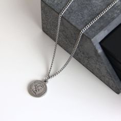 This stainless steel coin pendant necklace is an excellent choice for a trendy yet sophisticated look that won't tarnish or rust, even when worn in the water. 💎Free shipping on all orders💎Waterproof and non-tarnish💎Packaging that is ready to offer as a gift💎Customizable and adjustable chain length A coin pendant necklace, a great gift idea for yourself of for others This bestselling pendant necklace is a unique gift for the important people in your life, guaranteed to bring joy to the recipi Silver Necklace Set, Coin Pendant Necklace, Necklace For Men, Silver Coin, Steel Necklace, Coin Pendant, Silver Chain Necklace, Silver Coins, Stainless Steel Necklace